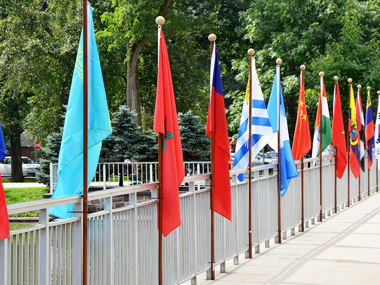International flags lined up along the Slep Portico